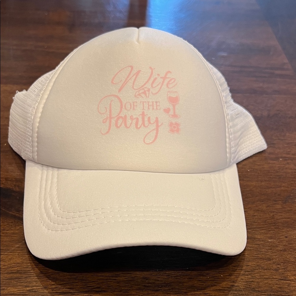 White 'Wife of the Party' Trucker Hat with 7 Pink ‘The Party’ Trucker Hats.